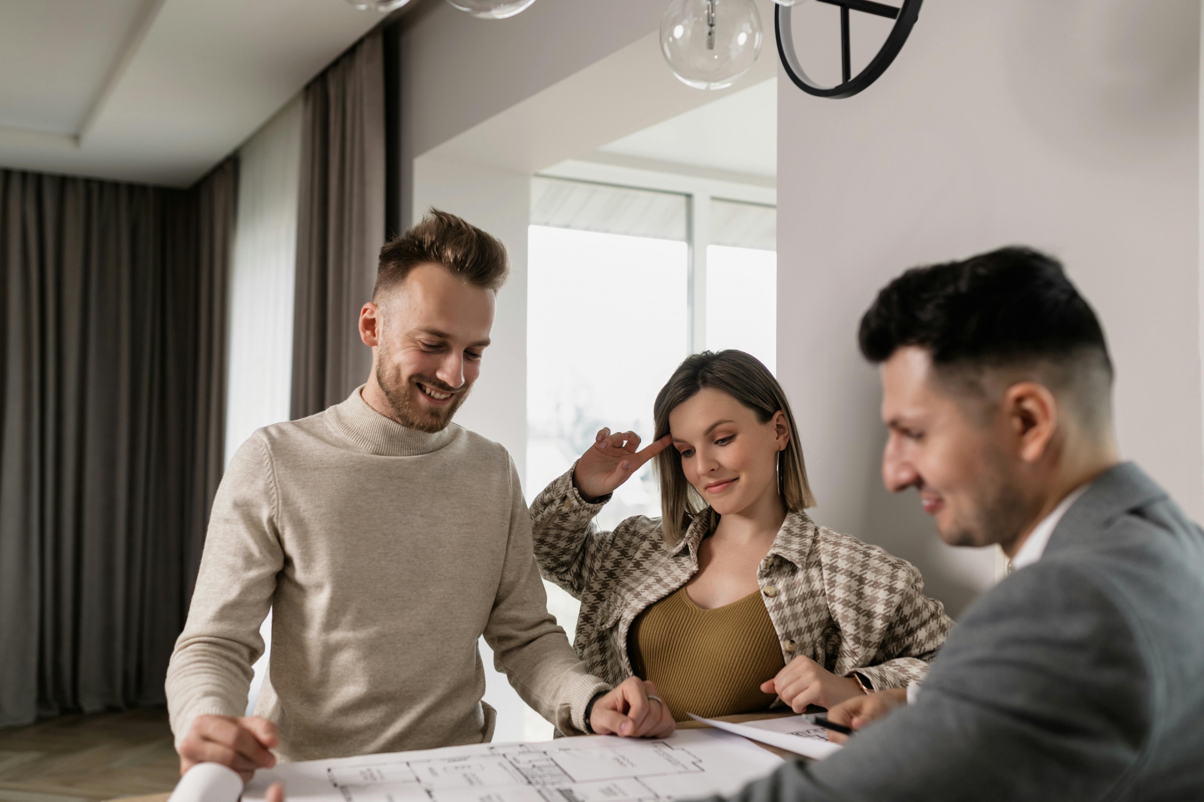 Business colleagues collaborating at a conference table in a modern office.