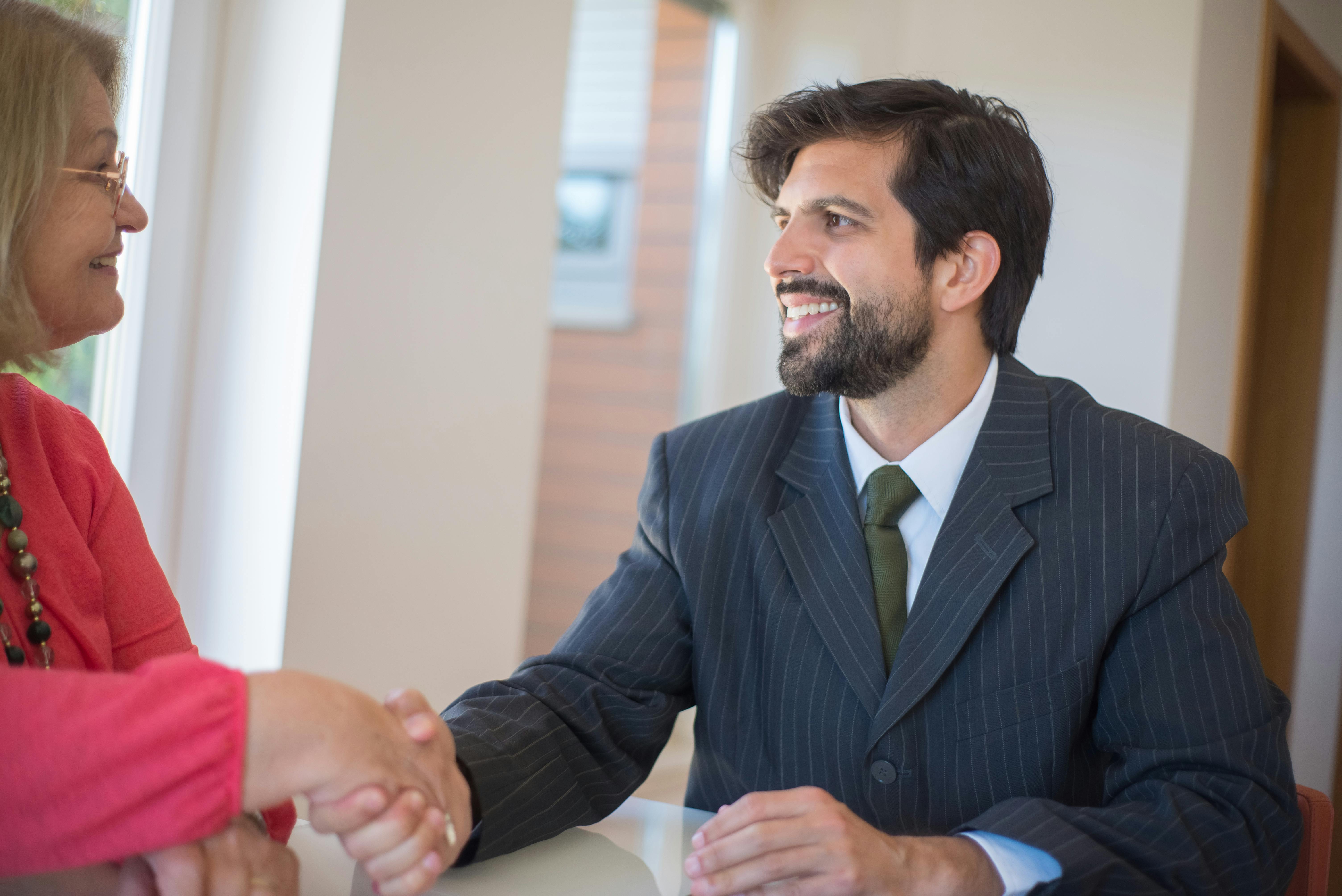 Business professional using a payment card.